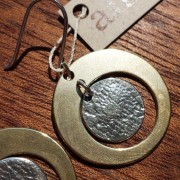 antique bronze satellite orbits a sterling silver moon handcrafted by allie b