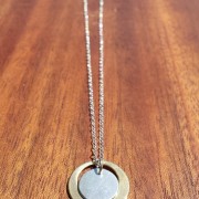 antique bronze satellite orbits a sterling silver moon handcrafted by allie b